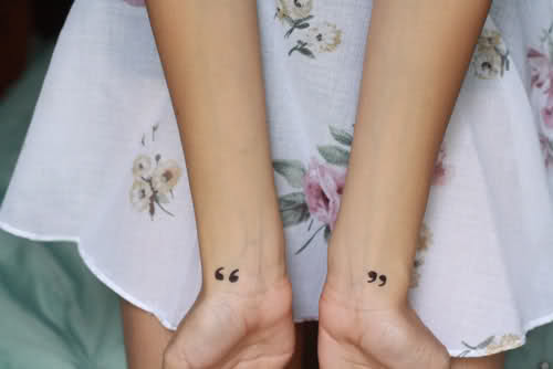 Speech marks tattoo