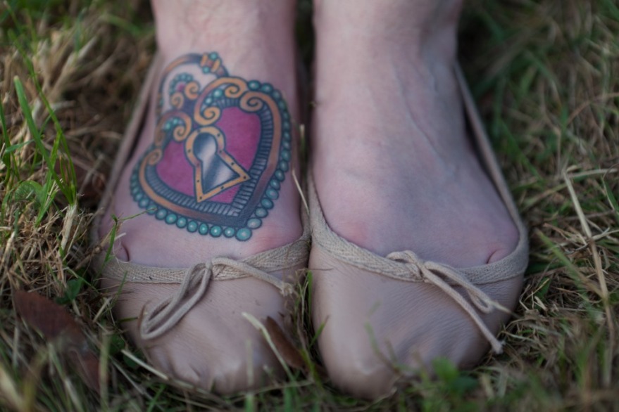 Padlock tattoo on foot